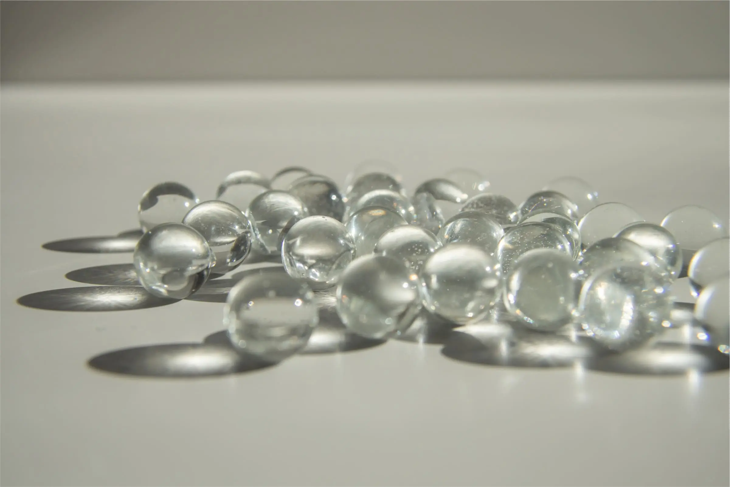 Unraveling the Mystique of Glass Pearls in Abstract Art